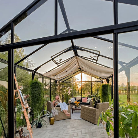 A Scandiglas greenhouse in an owner's garden