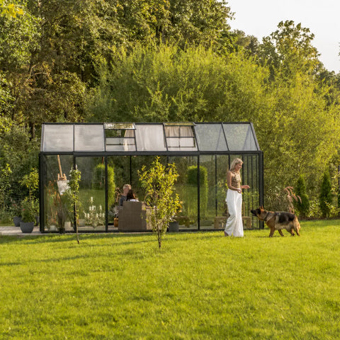 A Scandiglas greenhouse in an owner's garden