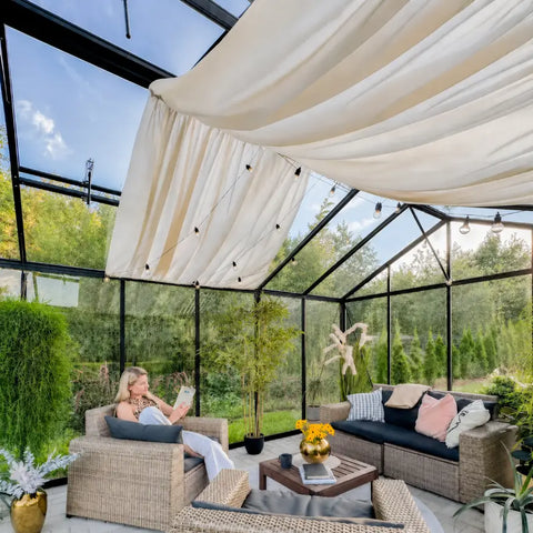 A Scandiglas greenhouse in an owner's garden