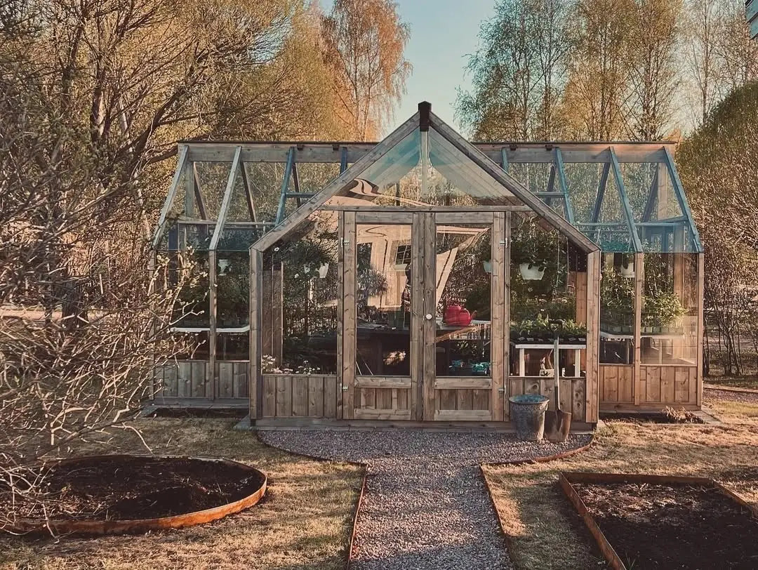 Customer's Nordwood greenhouse in their backyard