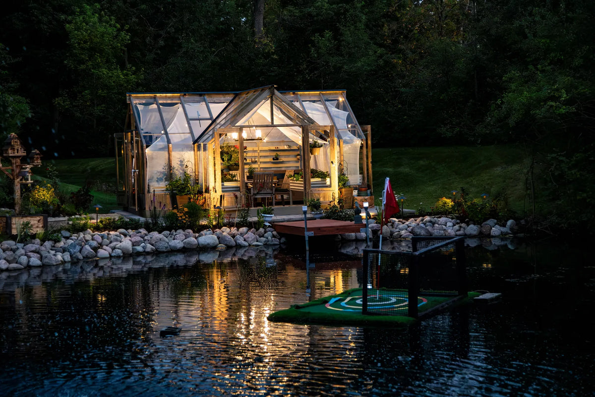 Lit up at dusk, over the pond