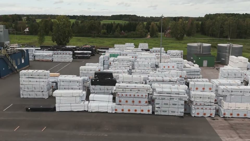 Packed greenhouse kits in the factory yard, ready to ship